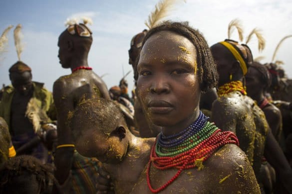 Dassanech Tribe People Putting Cow Dungs On Their Bodies For A Ceremony, Omorate, Omo Valley, Ethiopia
