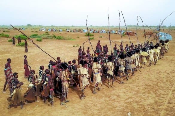 Aerial view of dimi ceremony in the Dassanech tribe to celebrate circumcision of teenagers, Omo Valley, Omorate, Ethiopia