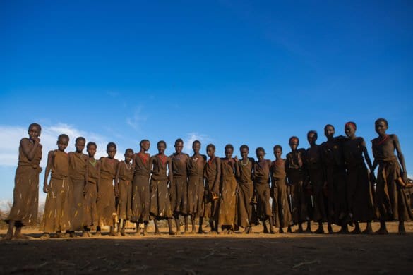 Circumcised boys from the dassanech tribe staying together until they are healed, Omo valley, Omorate, Ethiopia