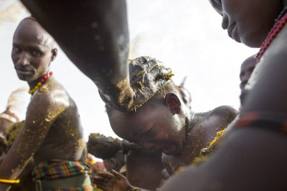 Dassanech Tribe People Putting Cow Dungs On Their Bodies For A Ceremony, Omorate, Omo Valley, Ethiopia