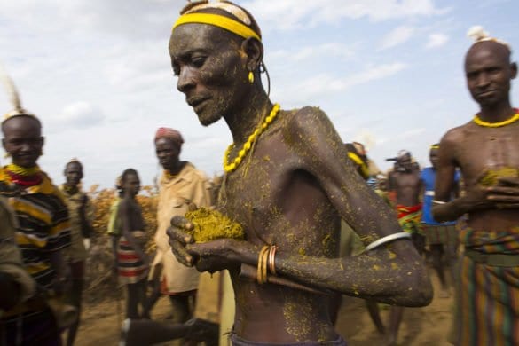 Dassanech Tribe People Putting Cow Dungs On Their Bodies For A Ceremony, Omorate, Omo Valley, Ethiopia